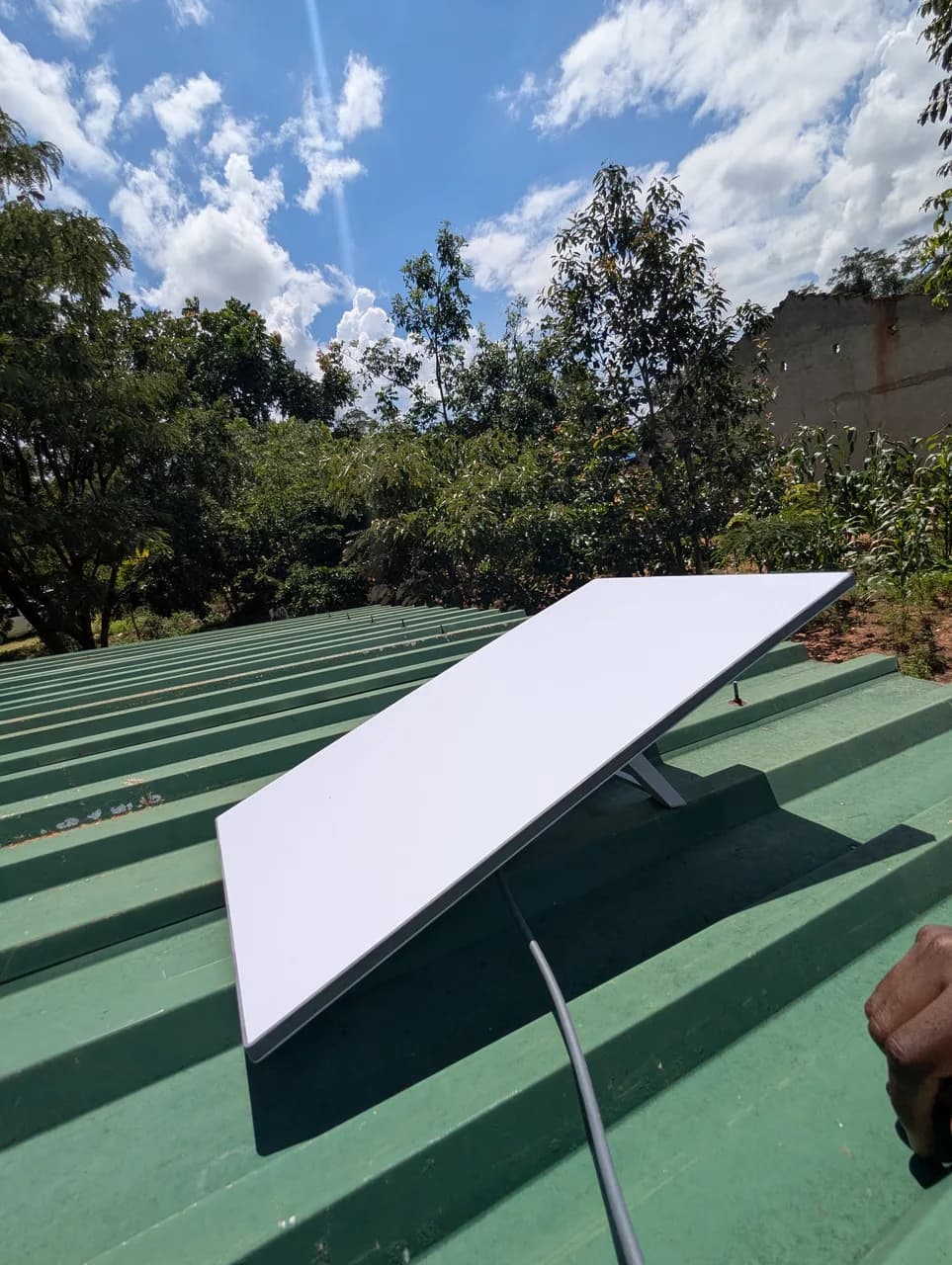 Starlink dish installed on a metal roof in Zimbabwe